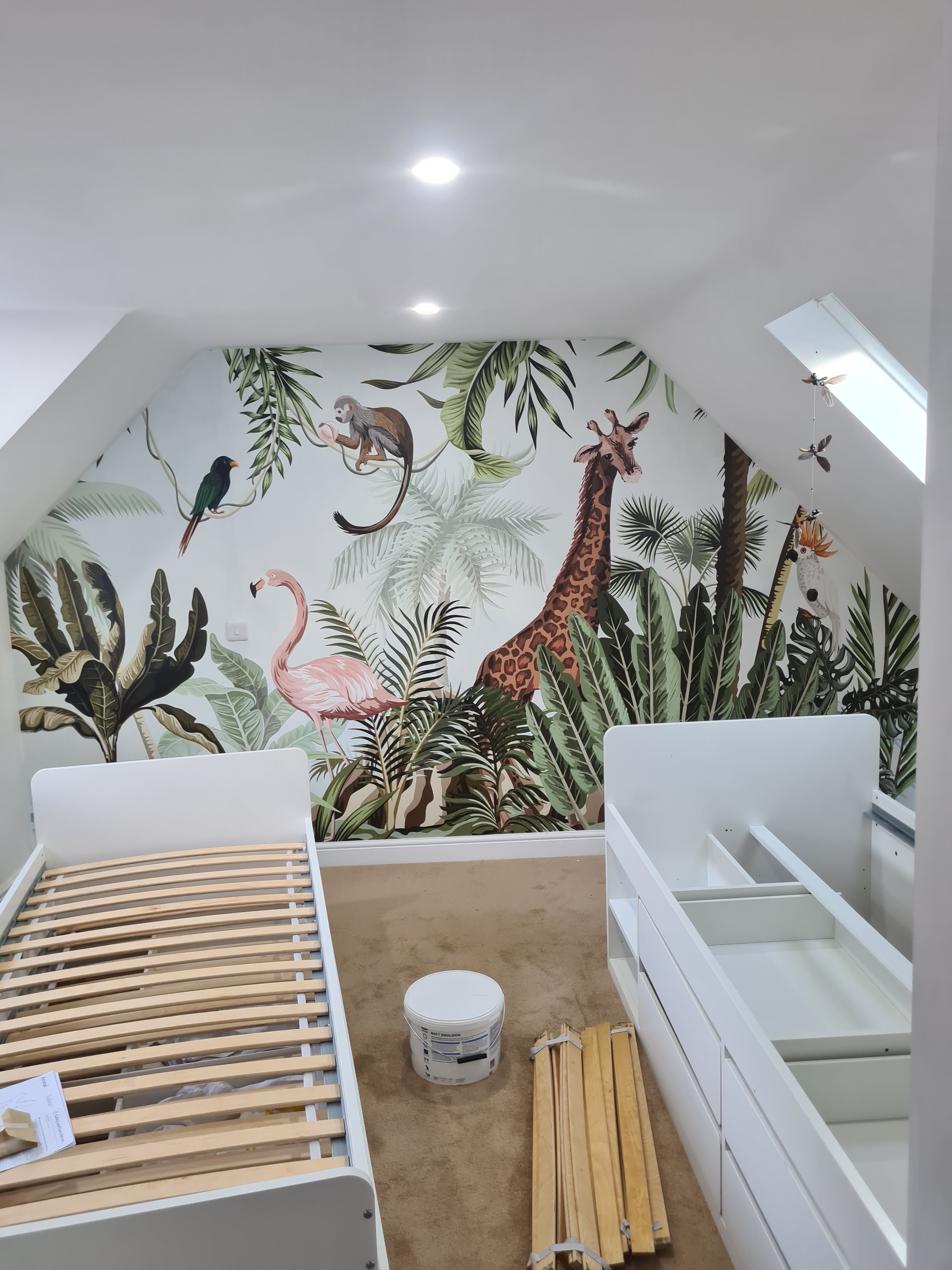 Jungle mural wallpaper in children's bedroom