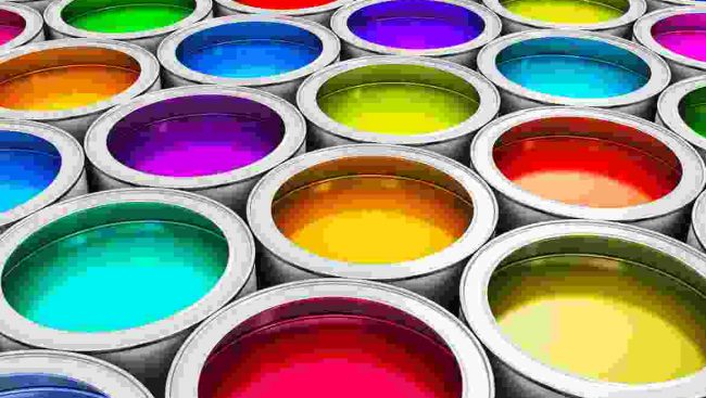 A group of colorful paint cans on a white background.