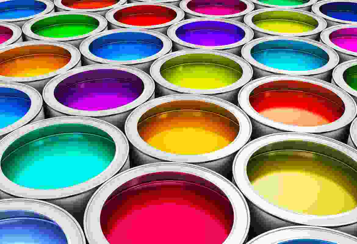 A group of colorful paint cans on a white background.