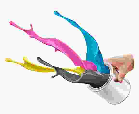 A person is pouring colored ink into a can.
