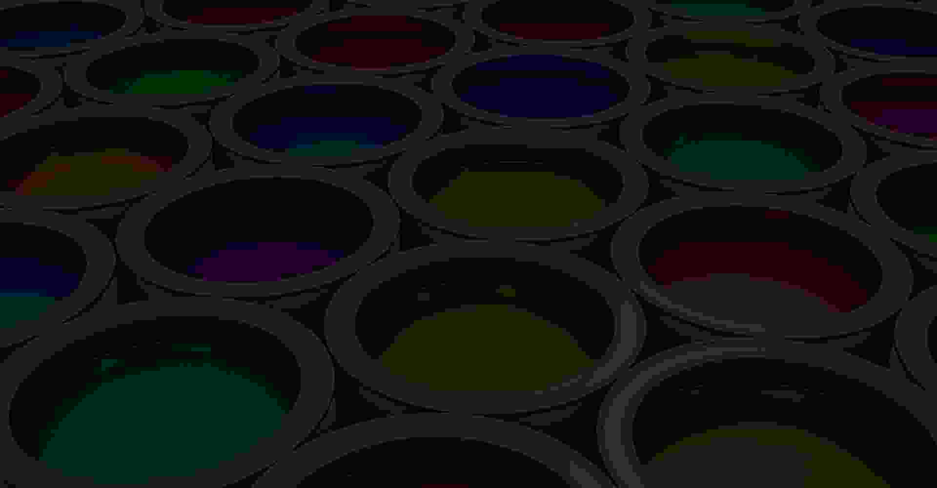 A black background with a lot of colorful circles.