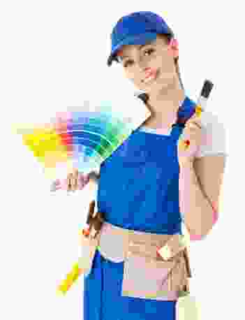 A woman holding a paint brush and a paint palette.