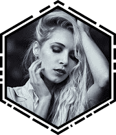 A black and white photo of a woman with long blonde hair.