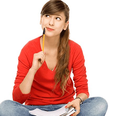A girl sitting on the floor with a pencil in her hand.