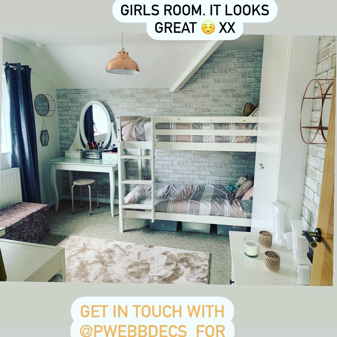 A girl's room with a bunk bed.