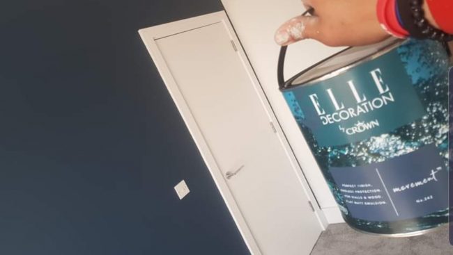 A person is holding a book in their hand.