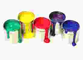 A group of colorful paint cans on a white background.