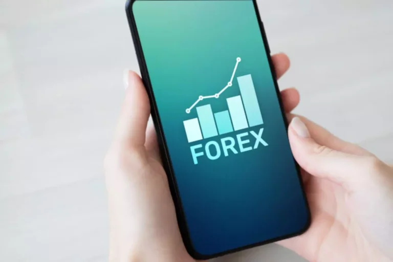 Hands holding smartphone with Forex chart.